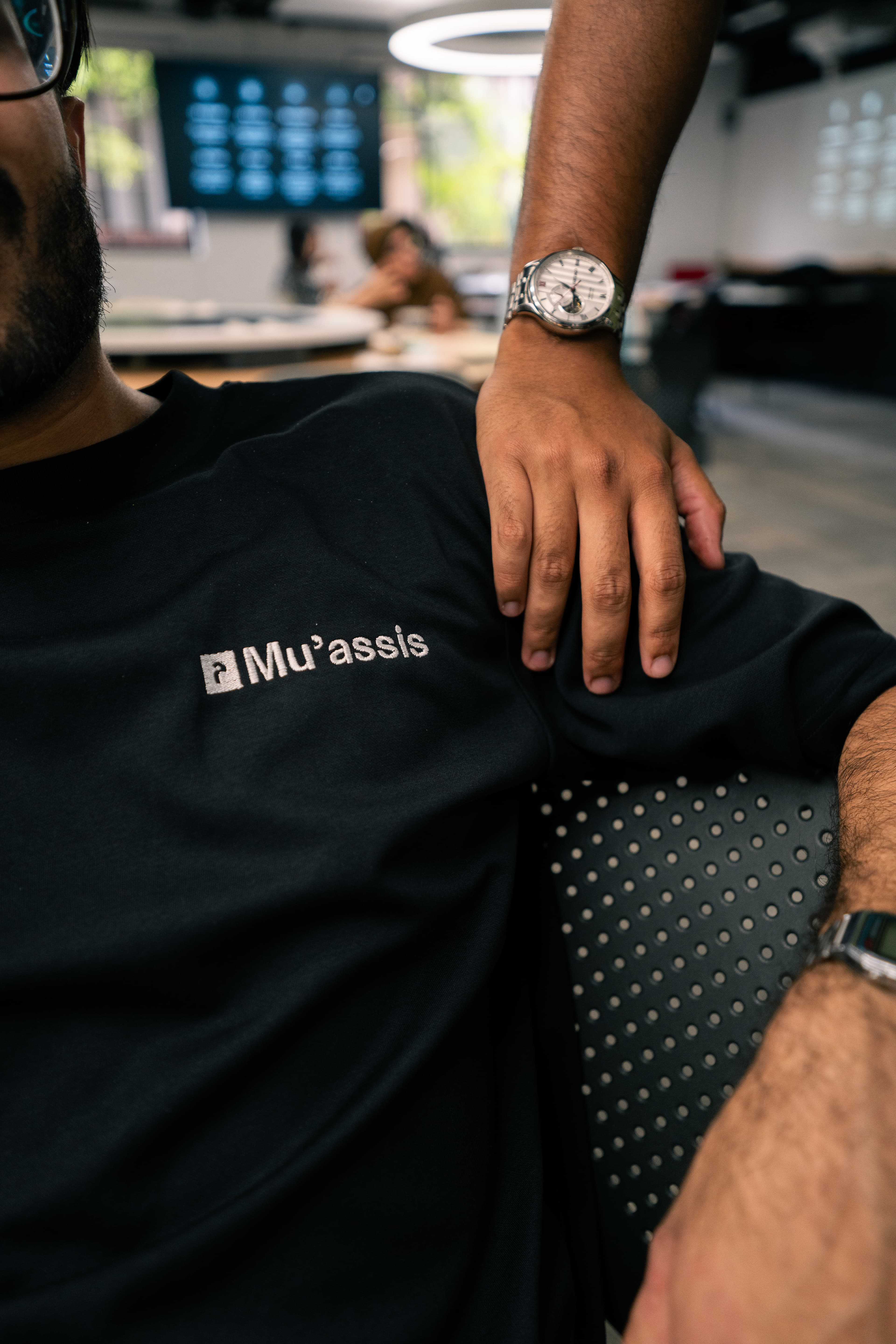 Strategy session with documents and devices.